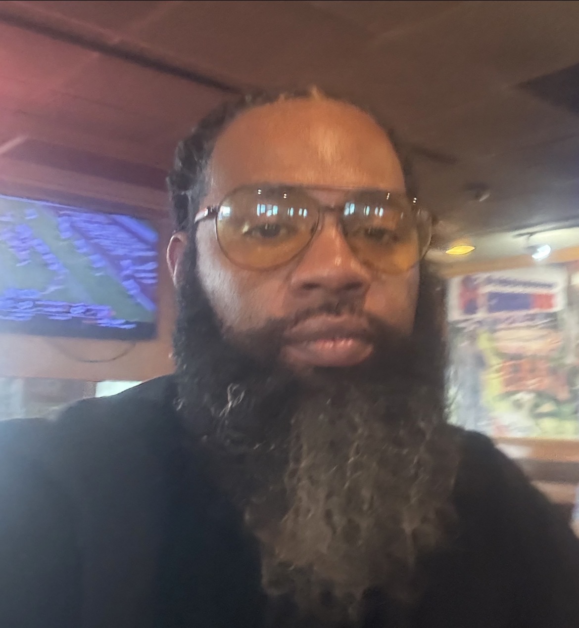 Dennis Dawson, your barber at Hood Cuttz